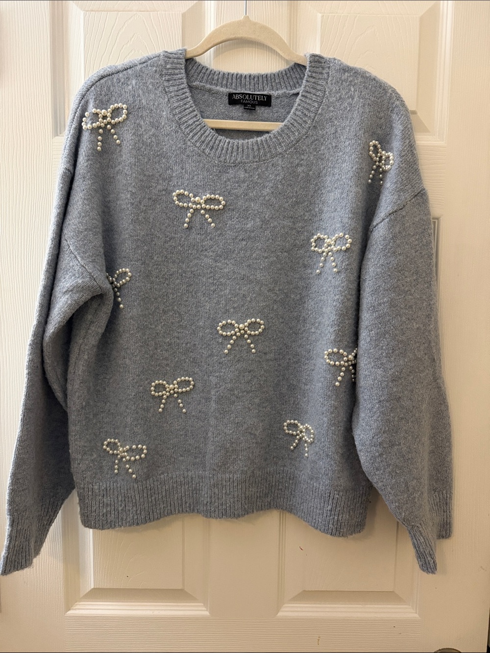 Pearl bow sweater sz XL